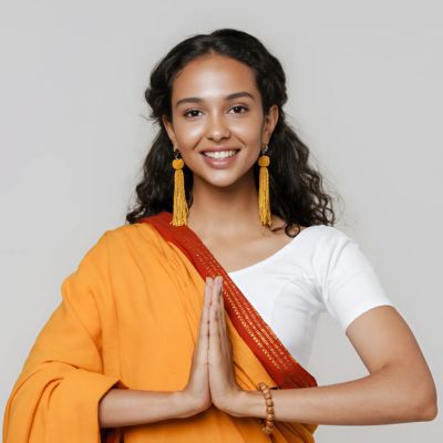 South Asian girl doing namaste 