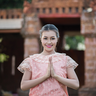 Foreigner lady greeting in Indian style (Namaste)