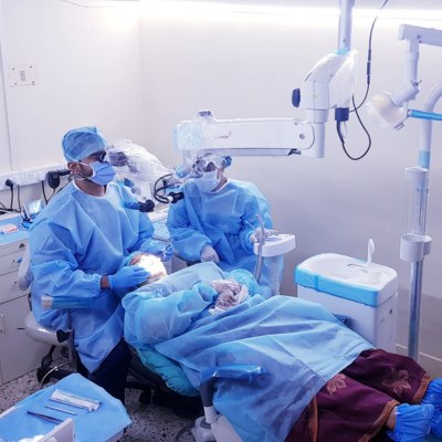 Dentists examining a patient