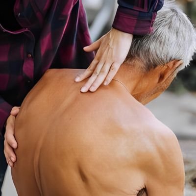 old man with degenerative scoliosis