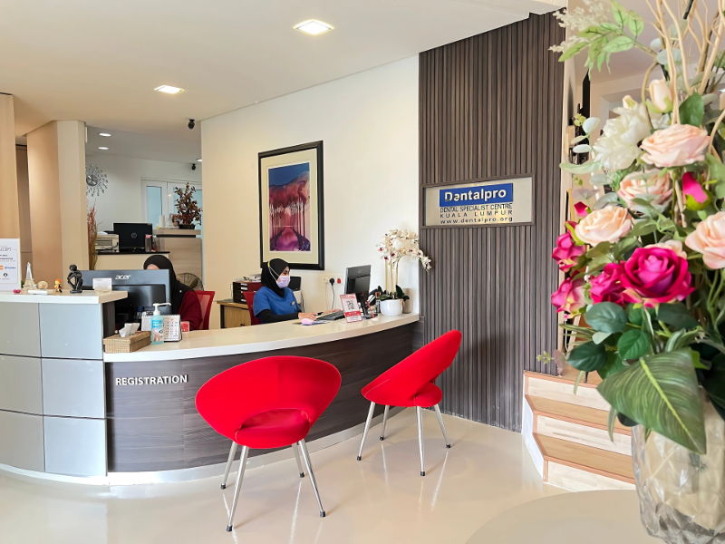 Reception Hall of Dental pro clinic with a receptionist sitting 