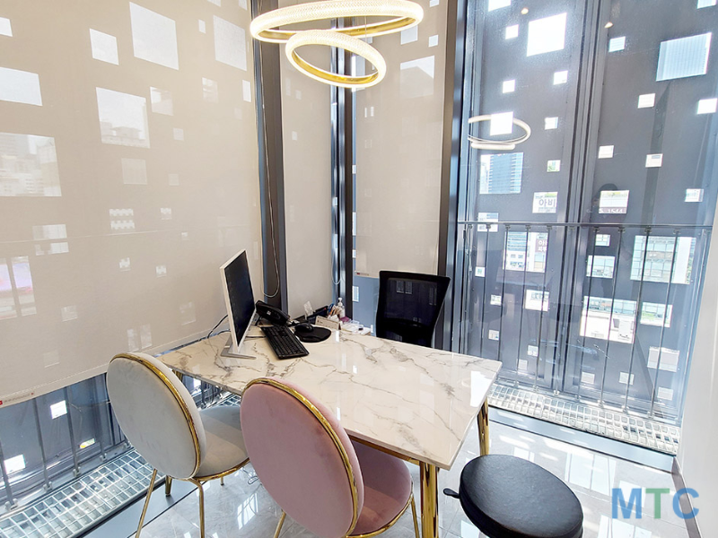 Consultation Room of a cosmetic clinic in Seoul, South Korea with a view of the city.