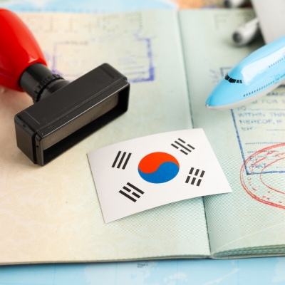 A Korean flag and seal depicting government documentation