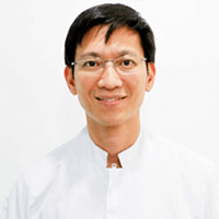 Dr. Kanit Dhanesuan - Oral surgeon in Thailand
